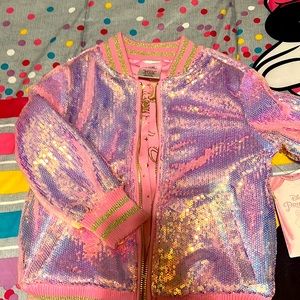 NWT size 3 little pink jacket!!! Liner has some princess movie symbols!